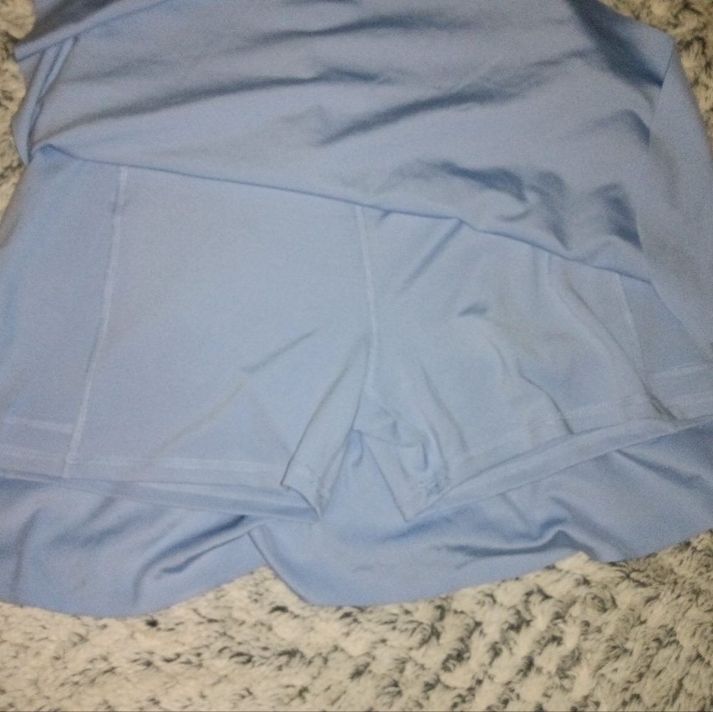 Ladies active sport skirt with built-in shorts